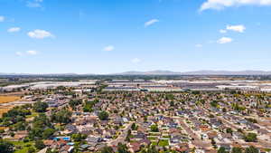 Aerial perspective of suburban area featuring mountains