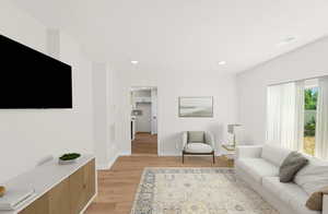 Full-size living room with brand new laminate flooring and large bay window. Let’s in the natural light and beautiful outdoor views