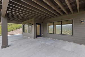 Covered deck with a perfect spot for a hot tub