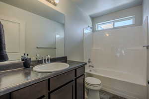 Full bath with vanity and shower / bathtub combination