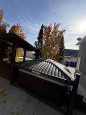 View of patio featuring a jacuzzi