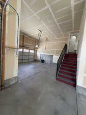 Garage featuring a garage door opener