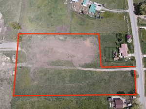 Aerial overview of property's location featuring property boundaries highlighted
