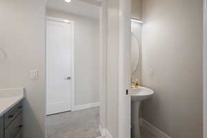 Bathroom featuring baseboards