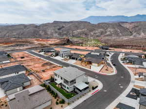 Aerial view of residential area with a mountainous background