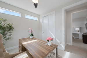 Office with light colored carpet