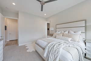 Bedroom with recessed lighting, light carpet, and a ceiling fan