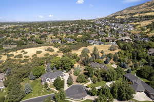Aerial view of property's location featuring nearby suburban area