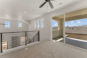 Carpeted empty room with recessed lighting and a ceiling fan