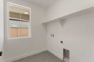 Laundry area featuring hookup for a washing machine, hookup for an electric dryer, and hookup for a gas dryer