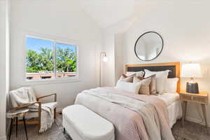 2nd bedroom with separate exterior entrance and vaulted ceilings