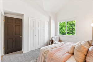 2nd bedroom with separate exterior entrance and vaulted ceilings