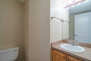 Bathroom with toilet and vanity