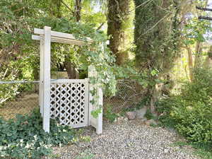 View of yard featuring a gate