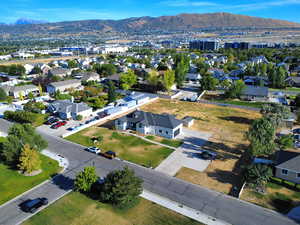 Aerial perspective of suburban area featuring mountains