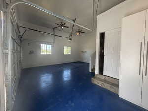 Painted floors, door to 3/4 bathroom