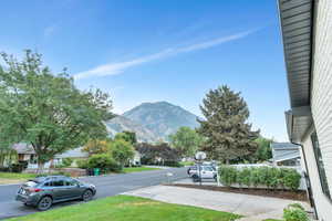 View of asphalt street with a mountain view
