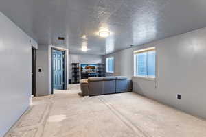 Living area with a textured ceiling