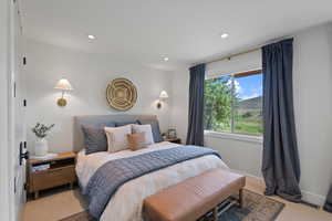Bedroom featuring recessed lighting and light colored carpet
