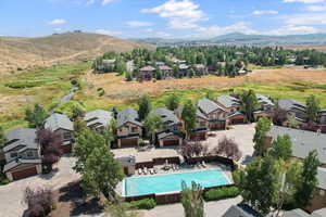 Aerial view of residential area featuring a mountain backdrop