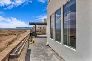 View of patio featuring a pergola and a mountain view