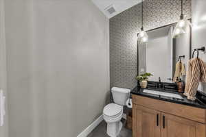 Bathroom with vanity and tile patterned flooring
