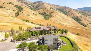 View from above of property featuring a mountainous background
