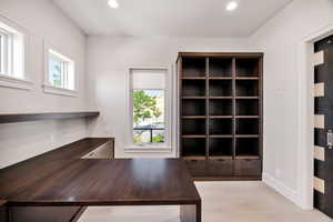 Unfurnished office with recessed lighting and light wood-type flooring