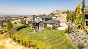 Aerial perspective of suburban area with a mountain backdrop