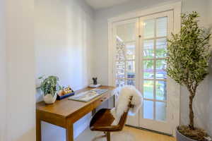 Office space featuring wood finished floors