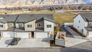 Aerial view of residential area with a mountain backdrop
