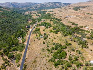 Overview of rural landscape featuring a mountain backdrop