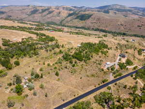 View of property location with rural landscape and a mountainous background