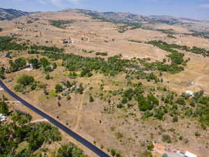 View of property location with rural landscape and a mountain backdrop