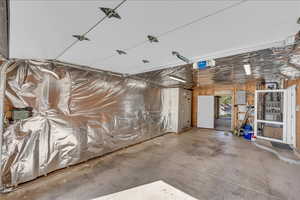 Garage featuring electric panel