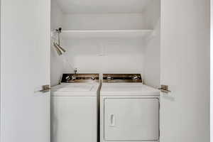 Laundry area with washing machine and dryer