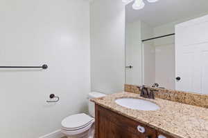Full bathroom featuring vanity and a shower