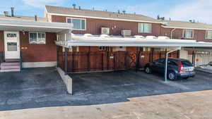 Covered parking lot with entry steps