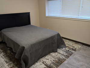 Bedroom with baseboards