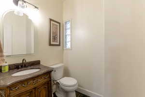 Bathroom with baseboards and vanity