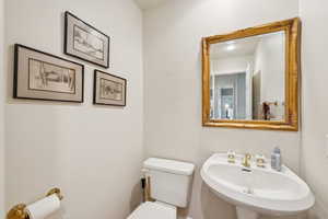 Bathroom featuring toilet and a sink