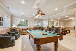 Playroom with carpet flooring, crown molding, a wainscoted wall, recessed lighting, and pool table