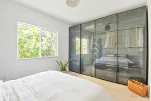 Bedroom featuring wood finished floors