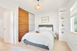 Bedroom featuring light wood-type flooring