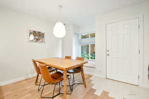 Dining room featuring light wood-style flooring