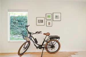 Detailed view of baseboards and wood finished floors