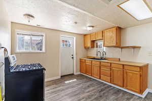 Could rearrange cabinets to put stove along that wall and have a little more living area if desired.