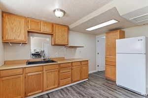 Good amount of cabinets, but no dishwasher downstairs.