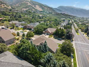 Aerial view of residential area featuring a mountain backdrop