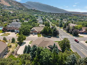 Aerial perspective of suburban area with a mountain backdrop